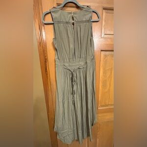 Olive green 100% polyester dress with front and back ties.  Size women’s medium